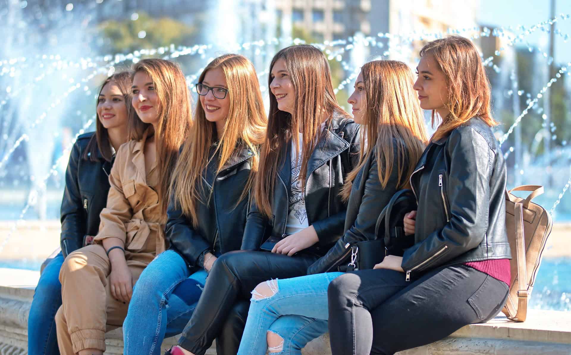 6 women sitting together