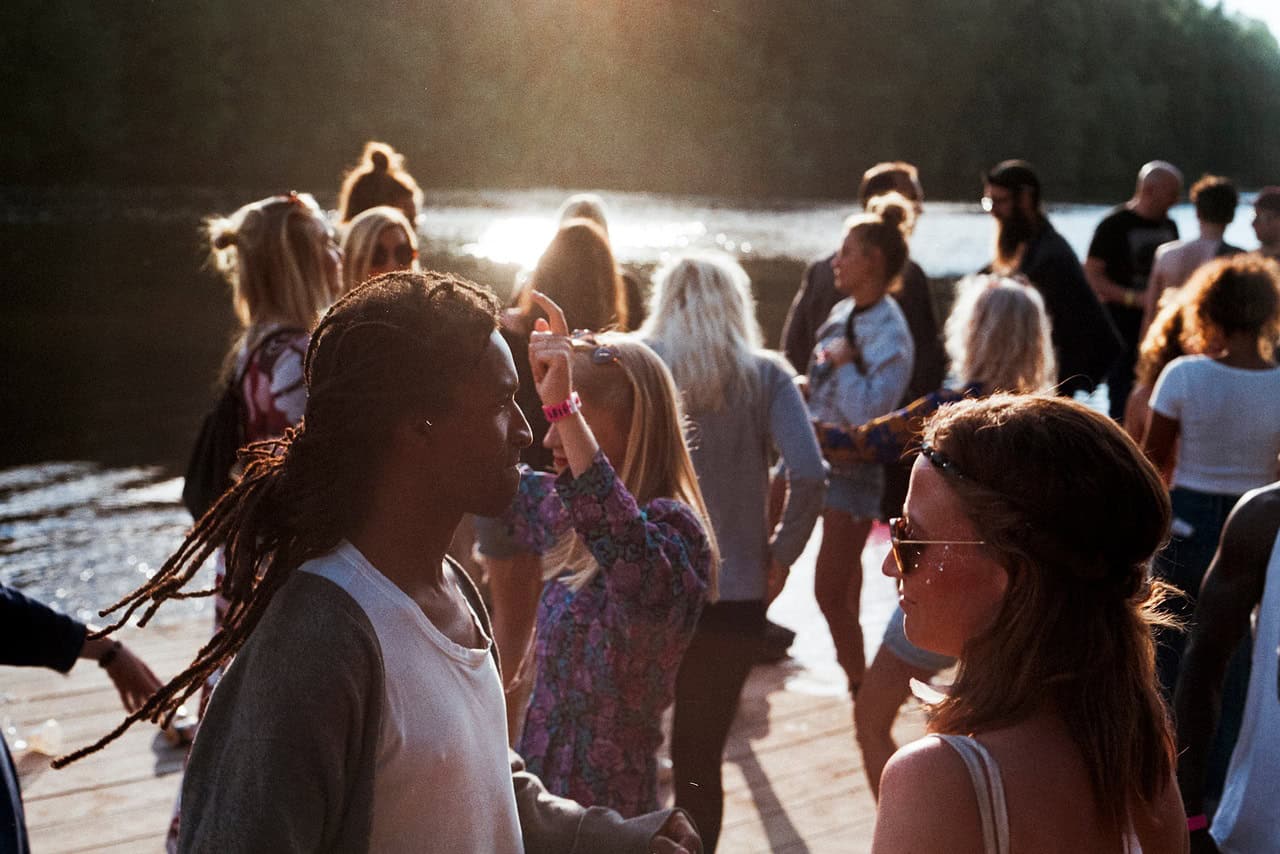 People socializing on a dock