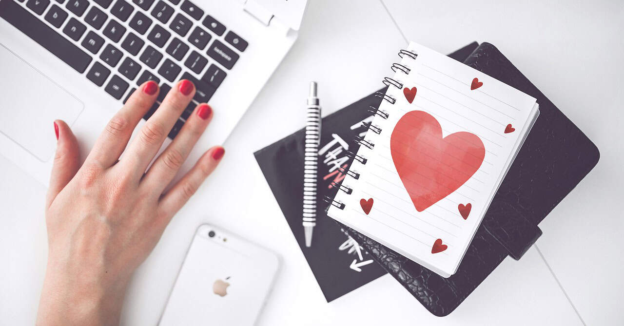 woman's hand on keyboard